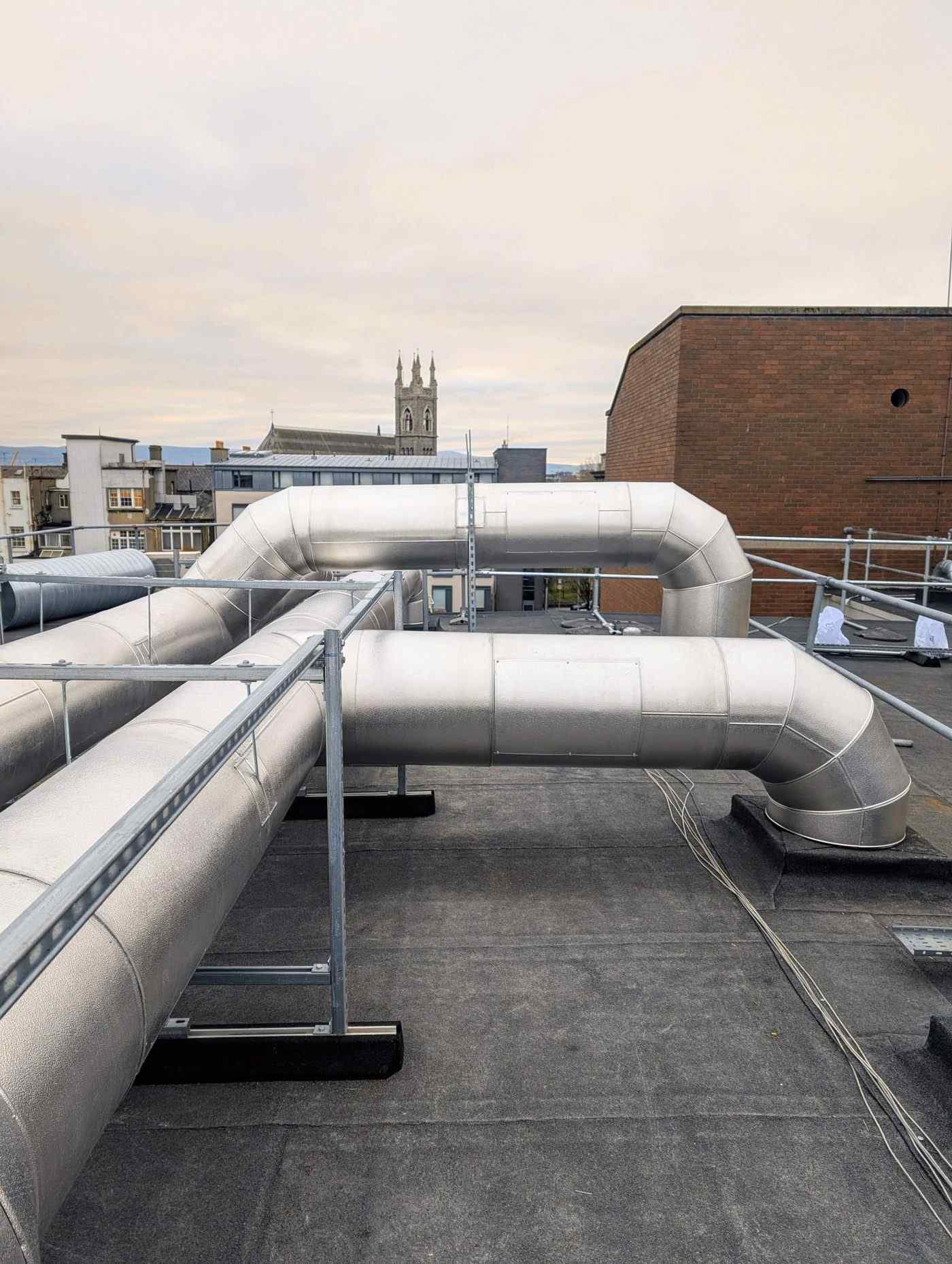 Aluminium cladding rooftop installation — Alumitherm Assist Ltd